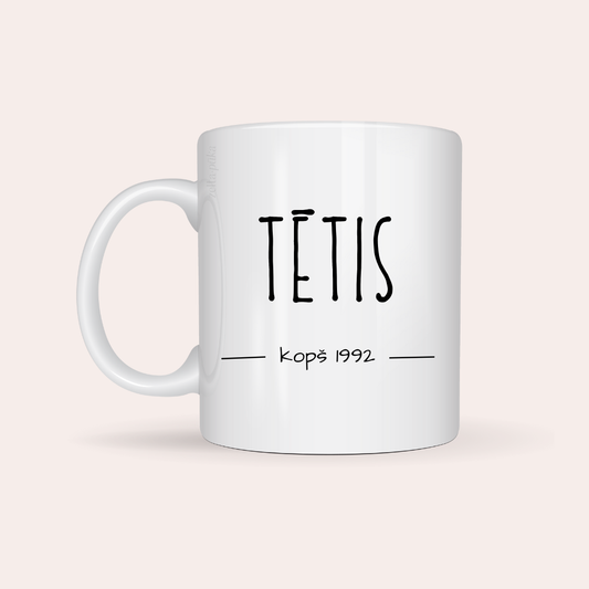 Balta personalizēta krūze ar uzrakstu TĒTIS kopš 1992