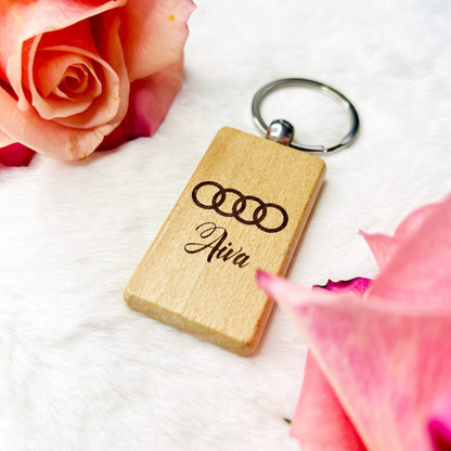 Wooden keychain with personalized engraving.