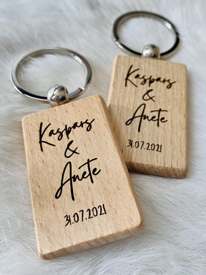 Wooden keychain with personalized engraving.